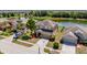 Aerial view of the home with a pond in the back at 7852 Stoney Hill Dr, Wesley Chapel, FL 33545