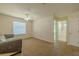 This bonus room features carpet flooring, a ceiling fan, and a small seating area at 7852 Stoney Hill Dr, Wesley Chapel, FL 33545
