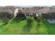 Aerial view of the backyard with the green lawn at 7912 Yale Harbor Dr, Wesley Chapel, FL 33545