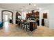 Spacious kitchen island featuring granite countertops and modern stainless steel appliances at 7912 Yale Harbor Dr, Wesley Chapel, FL 33545