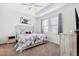 Bedroom with carpet flooring, ceiling fan, natural light and neutral décor at 8496 Starlight Loop, Parrish, FL 34219