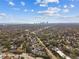 Wonderful aerial view displays the neighborhood and nearby city skyline in the distance, highlighting the property's location at 1020 38Th N Ave, St Petersburg, FL 33704