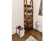Neatly organized bathroom storage solutions include a ladder shelf and toilet paper holder at 1020 38Th N Ave, St Petersburg, FL 33704