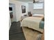 Bedroom featuring two twin beds, tile floors, a ceiling fan, and a window at 1020 38Th N Ave, St Petersburg, FL 33704