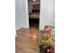 En-suite bedroom with tropical bedding and dark wood bed frame visible from doorway at 1020 38Th N Ave, St Petersburg, FL 33704