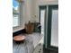 Kitchen counter featuring marble countertops, decorative items, and natural light from the window at 1020 38Th N Ave, St Petersburg, FL 33704