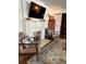 Elegant living room with a marble fireplace and stylish seating arrangement at 1020 38Th N Ave, St Petersburg, FL 33704