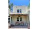 Inviting covered patio with comfortable seating and view of yard at 1020 38Th N Ave, St Petersburg, FL 33704