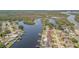 Waterfront homes with docks and canals, showcasing a desirable coastal lifestyle at 1118 Lodestar Dr, Holiday, FL 34690