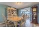 Charming dining room with elegant furnishings, wood floors, and ample natural light at 1118 Lodestar Dr, Holiday, FL 34690