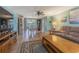 Spacious living room with cozy furniture, wood floors, and inviting natural light at 1118 Lodestar Dr, Holiday, FL 34690