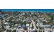 An aerial view of a coastal neighborhood with a beach in the background at 1210 Bay Pine Blvd, Indian Rocks Beach, FL 33785