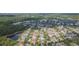 Residential area featuring homes near a serene lake and lush green spaces at 12204 Coldstream Ln, Tampa, FL 33626