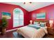 Cozy bedroom with a comfortable bed, stylish decor, and plenty of natural light at 12204 Coldstream Ln, Tampa, FL 33626