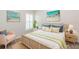 Bright bedroom features beach themed decor, natural light, and wicker furniture at 12204 Coldstream Ln, Tampa, FL 33626