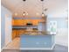 Well-lit kitchen with a granite island and stainless steel appliances at 12204 Coldstream Ln, Tampa, FL 33626