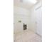 Utility Room with tile floors and white walls at 12204 Coldstream Ln, Tampa, FL 33626