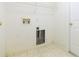 Utility Room with tile floors and white walls at 12204 Coldstream Ln, Tampa, FL 33626
