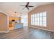 Open floor plan shows the living room and kitchen with breakfast bar at 12204 Coldstream Ln, Tampa, FL 33626