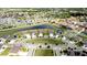An aerial view showcases a lovely planned community with sidewalks and large retention ponds for drainage at 13111 Bahia Grass Ln, Riverview, FL 33579