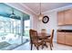 Bright breakfast nook with backyard views at 13111 Bahia Grass Ln, Riverview, FL 33579