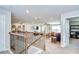 Spacious living room with plush carpet, fan, and natural light at 13111 Bahia Grass Ln, Riverview, FL 33579
