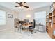 Bright home office with large windows and ample workspace at 13111 Bahia Grass Ln, Riverview, FL 33579