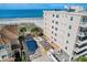 The property with pool is steps from the beach offering a luxury coastal lifestyle at 13440 Gulf Blvd # 202, Madeira Beach, FL 33708