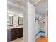 Bathroom with closet provides ample storage at 13440 Gulf Blvd # 202, Madeira Beach, FL 33708