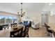 The combined kitchen, living and dining room feature tile floors at 13440 Gulf Blvd # 202, Madeira Beach, FL 33708