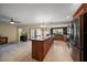 Open-concept kitchen with a large center island and modern stainless steel appliances at 14175 Feather Sound Dr, Clearwater, FL 33762