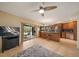 Open kitchen and breakfast bar, stainless appliances, and clear view of backyard pool at 14175 Feather Sound Dr, Clearwater, FL 33762
