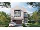 Charming two-story home with a stucco facade, a two-car garage, and professionally landscaped front yard at 143 Chesapeake Ave, Tampa, FL 33606