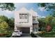 Charming two-story home with a stucco facade, a two-car garage, and professionally landscaped front yard at 143 Chesapeake Ave, Tampa, FL 33606