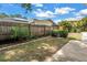 Fenced-in backyard with storage shed and well-maintained landscaping at 15604 Deerglen Dr, Tampa, FL 33624