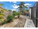 Well-maintained backyard with lush greenery and mature landscaping at 15604 Deerglen Dr, Tampa, FL 33624