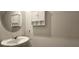 Neat half bathroom featuring a pedestal sink, cabinet, and a decorative mirror at 17015 Coral Key Dr, Nokomis, FL 34275