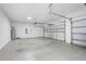 Spacious two-car garage with epoxy floors and an abundance of room at 17618 Cortes Creek Blvd, Spring Hill, FL 34610