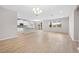 Spacious open-concept area with lots of natural light, seamlessly connecting the living and kitchen spaces at 17618 Cortes Creek Blvd, Spring Hill, FL 34610