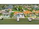 Waterfront property boasts a private dock and pool, perfect for boating enthusiasts and outdoor relaxation at 1901 Kansas Ne Ave, St Petersburg, FL 33703
