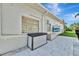 Exterior of home showcasing storage boxes, privacy window, and kayak racks for easy water access at 1901 Kansas Ne Ave, St Petersburg, FL 33703