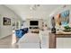 Stylish living room features a modern fireplace, vaulted ceilings, and comfortable seating at 1901 Kansas Ne Ave, St Petersburg, FL 33703