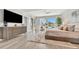 Spacious bedroom features stylish decor, water views, and modern furnishings at 1901 Kansas Ne Ave, St Petersburg, FL 33703