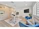 Comfortable office space with a modern desk, plush armchairs, and natural light from the windows at 1901 Kansas Ne Ave, St Petersburg, FL 33703