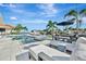 Outdoor oasis with a pool, lounge chairs, dining area, and boat access, perfect for relaxing by the water at 1901 Kansas Ne Ave, St Petersburg, FL 33703