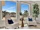 Cozy sitting area with waterfront view and stylish chairs, perfect for relaxation at 1901 Kansas Ne Ave, St Petersburg, FL 33703