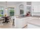Bright kitchen with a double sink, breakfast nook, and ample natural light at 19137 Lake Audubon Dr, Tampa, FL 33647