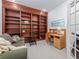 Cozy office with built-in bookshelves and a well-lit desk space at 19137 Lake Audubon Dr, Tampa, FL 33647