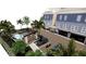 New townhome construction showing pool, covered parking, balconies and rooftop patios at 20 Outlook Way # 10, Dunedin, FL 34698
