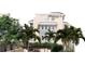 Front of new townhome construction showing covered parking, balconies and rooftop patios at 20 Outlook Way # 10, Dunedin, FL 34698